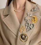 Spilla statement (metallo, design pulito) 