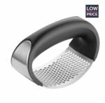 Curved garlic crusher 
